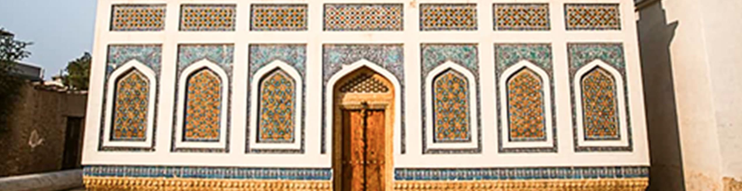 Traditional decorative wall art with colorful patterns and cultural motifs representing Sindhi heritage