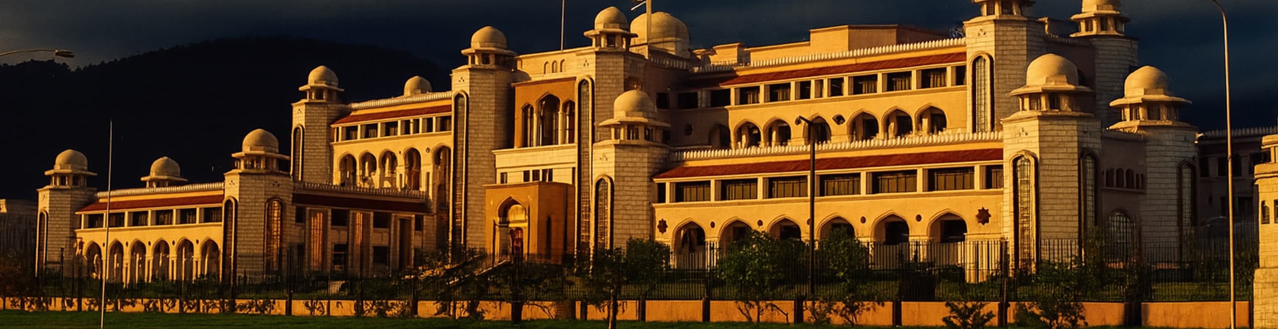 Large official government residence building with manicured grounds, formal entrance, and traditional governmental architectural style