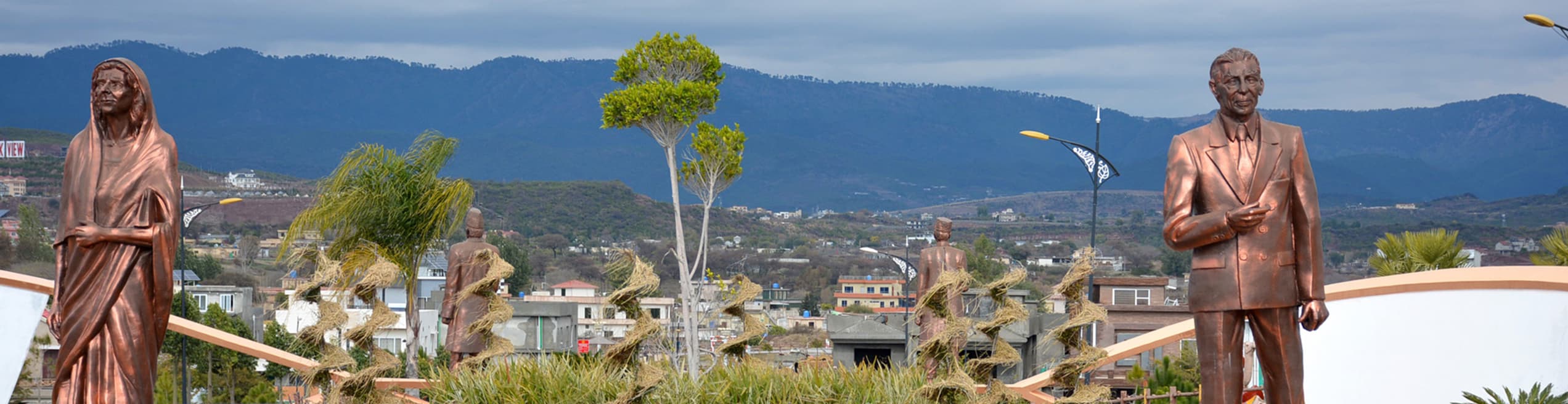 Commemorative statues honoring Pakistan's founding father Muhammad Ali Jinnah and his sister Fatima Jinnah located within Bahria Enclave