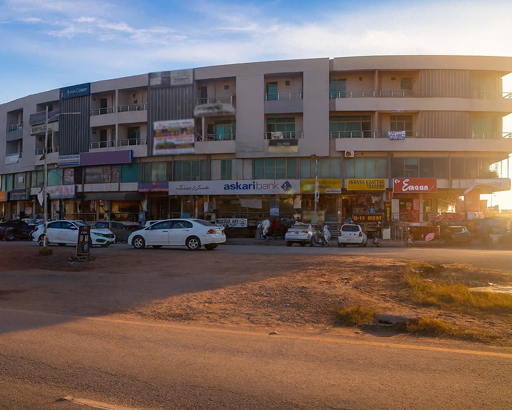 Bustling commercial center known as D-12 Markaz featuring shops, businesses and market facilities serving the residential community