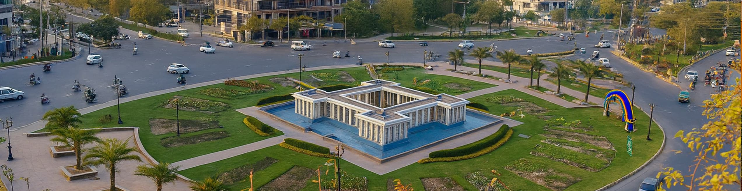 Liberty Chowk in Gulberg Lahore with traffic and city lights.