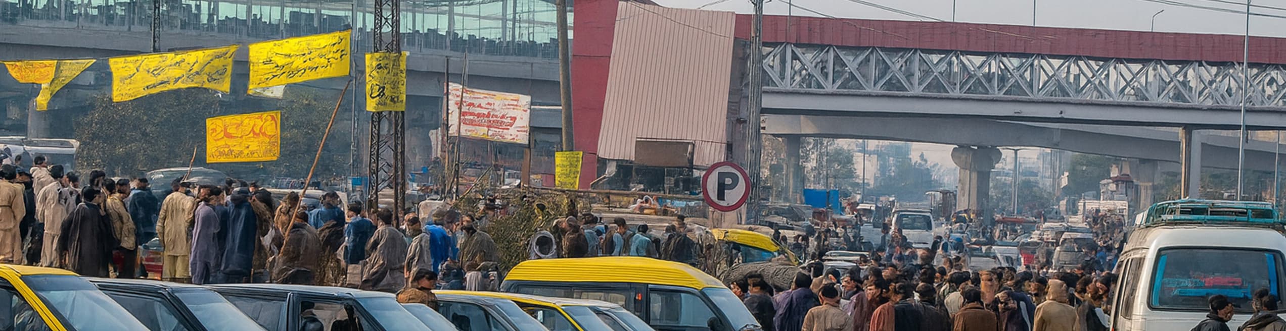Crowds and traffic near Rawalpindi Metro Station.