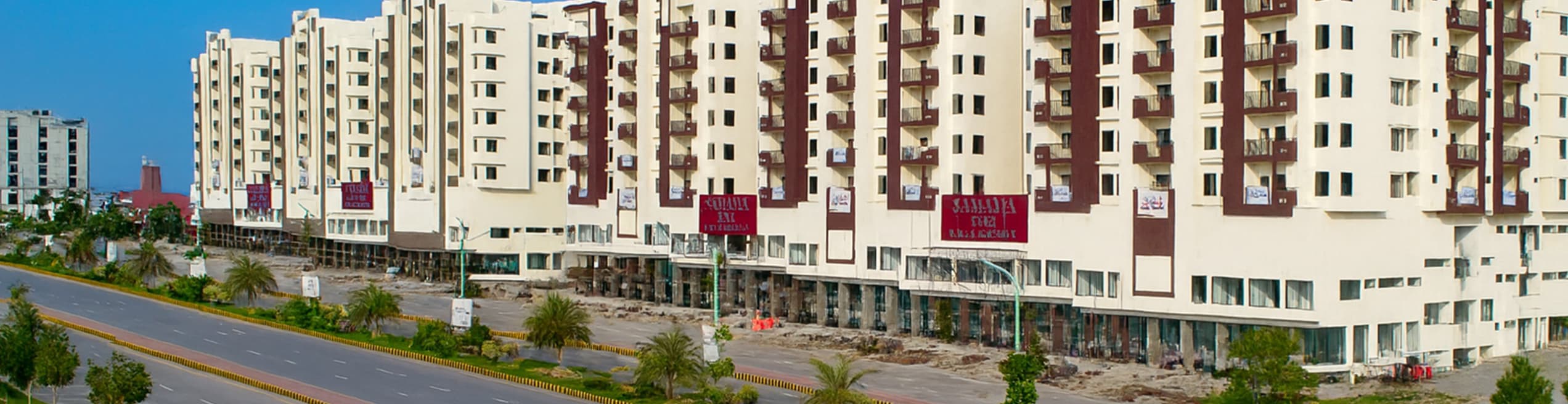 View of large, modern commercial buildings in Gulberg Greens Rawalpindi.