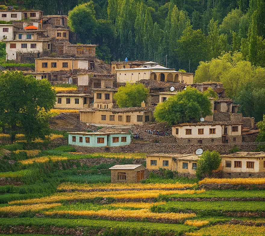 Traditional local houses in Sadpara Skardu with mountains in the backdrop.