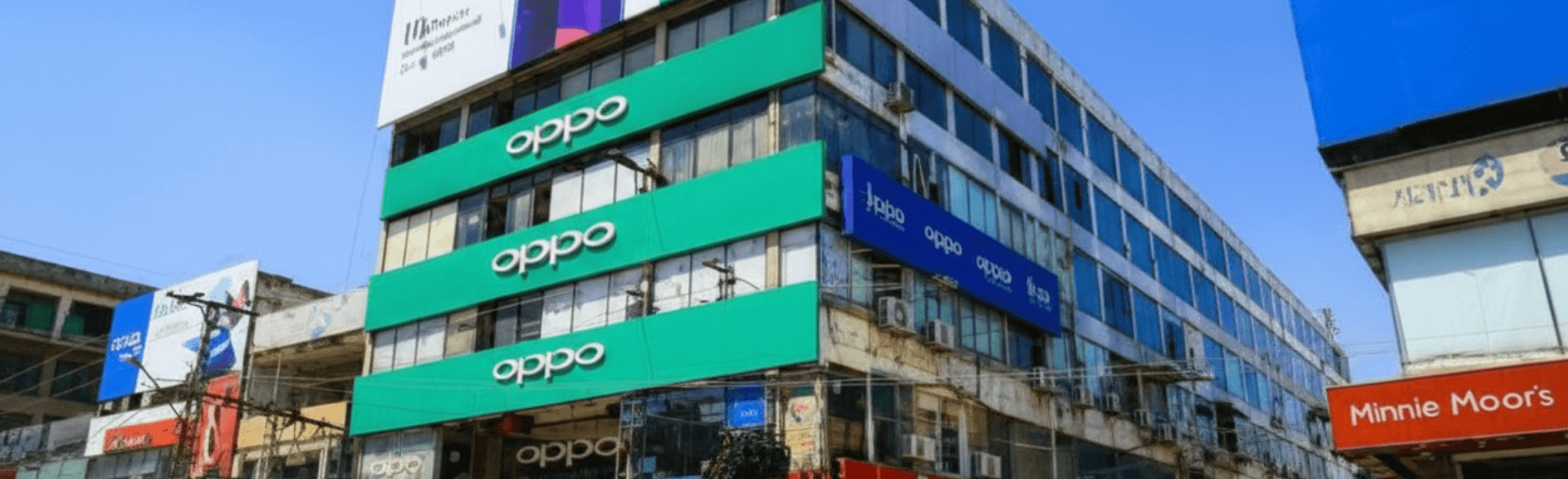 Street-side banner view of Singapore Plaza Bank Road Saddar Rawalpindi with shop lines, Inside corridor view of Singapore Plaza Rawalpindi mobile shops and repairing counters in Saddar