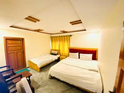 Twin bed room interior in Skardu, Clean bedroom at Skardu Rock View Hotel Aliabad