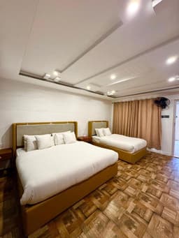 Family suite room with king and twin bed in Skardu, Premium accommodation Skardu for groups