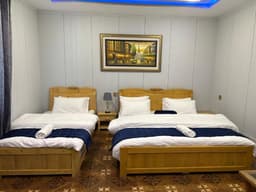 Family room with twin and single bed in Skardu, Spacious bedroom at Areena Hotel Skardu