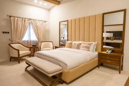 Suite bedroom with comfortable bed in Skardu hotel, Spacious sleeping area with air conditioning at K2 Hotel Skardu