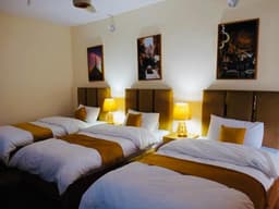 Room with three single beds in Skardu guest house, Spacious triple bed bedroom in Aliabad Skardu