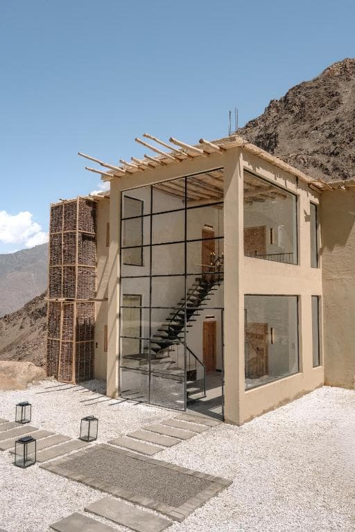 Exterior facade of Broq Resort Skardu with mountain backdrop, boutique resort building in Hussainabad Nala
