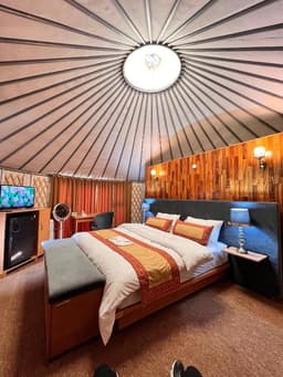 Deluxe double room with comfortable bed in Skardu, Apex Hotels and Resorts Skardu bedroom with mountain ambiance