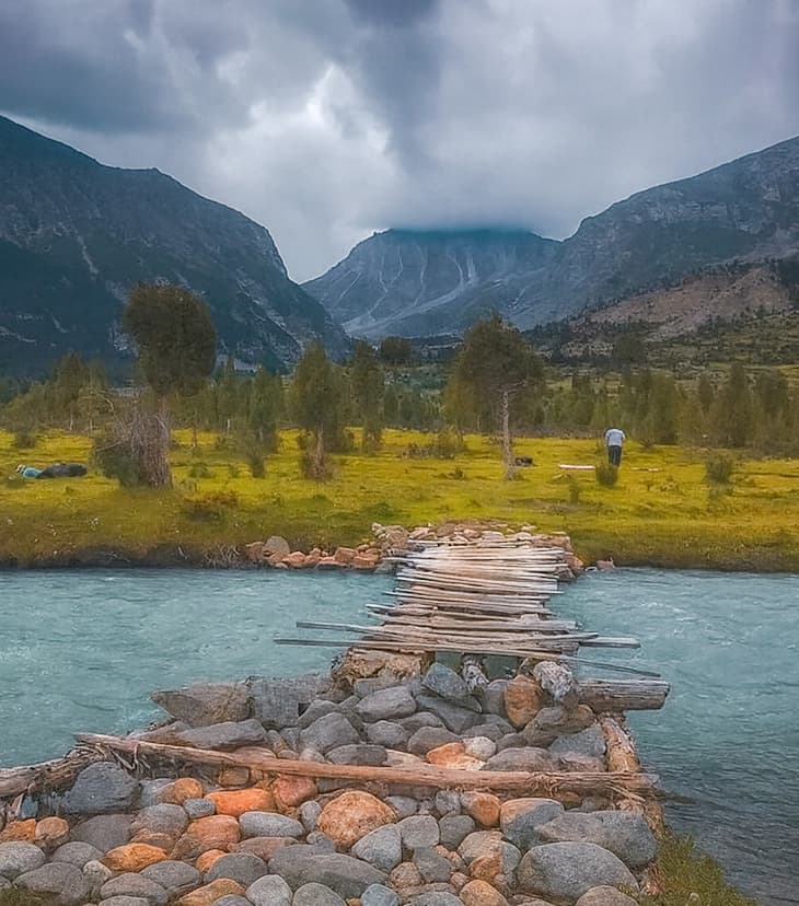 Picturesque Basho Valley, Skardu Scenic view of Basho Valley in Skardu, featuring lush greenery, rivers, and surrounding mountains.