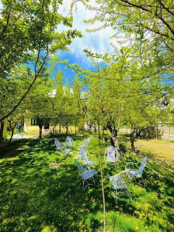 Double Bed and Mountain Facing Window in Rock View Hotel Skardu Double bed room with mountain facing window in Skardu, Clean room interior at Rock View Hotel Aliabad