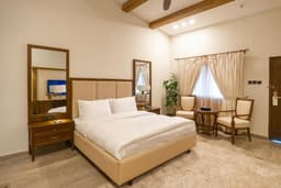 Deluxe Queen Room with Mountain View at K2 Hotel Skardu Deluxe queen room with comfortable bed in Skardu, Queen bed hotel room with mountain view at K2 Hotel