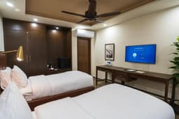 Deluxe Twin Room with Two Beds at K2 Hotel by Green Pak Skardu Deluxe twin room with two single beds in Skardu, Twin beds hotel room with air conditioning at K2 Hotel